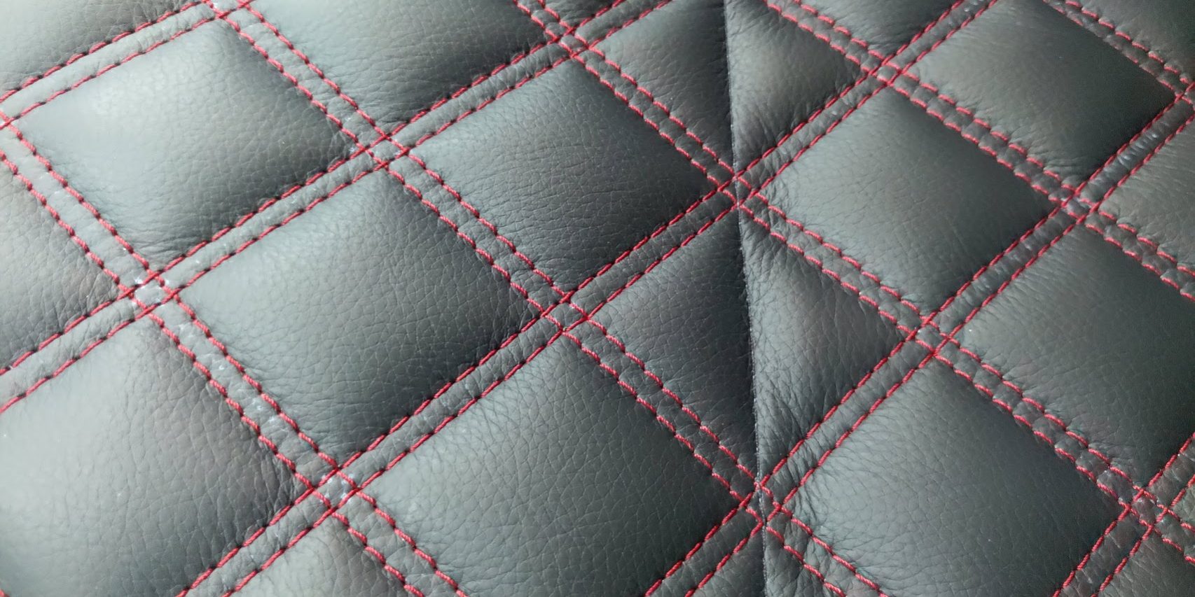 Quilted seat centre with red contrast stitching
