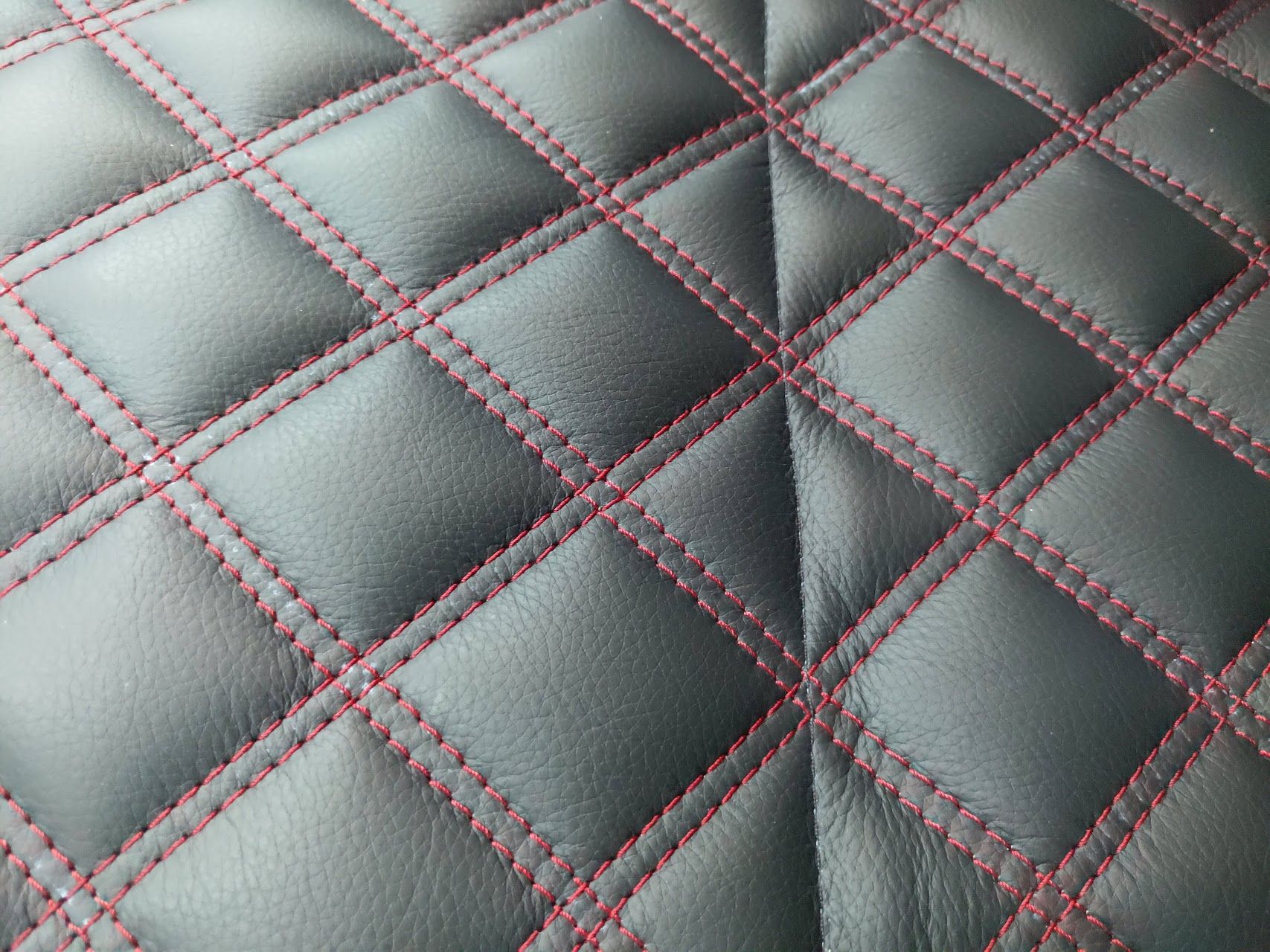 Quilted seat centre with red contrast stitching
