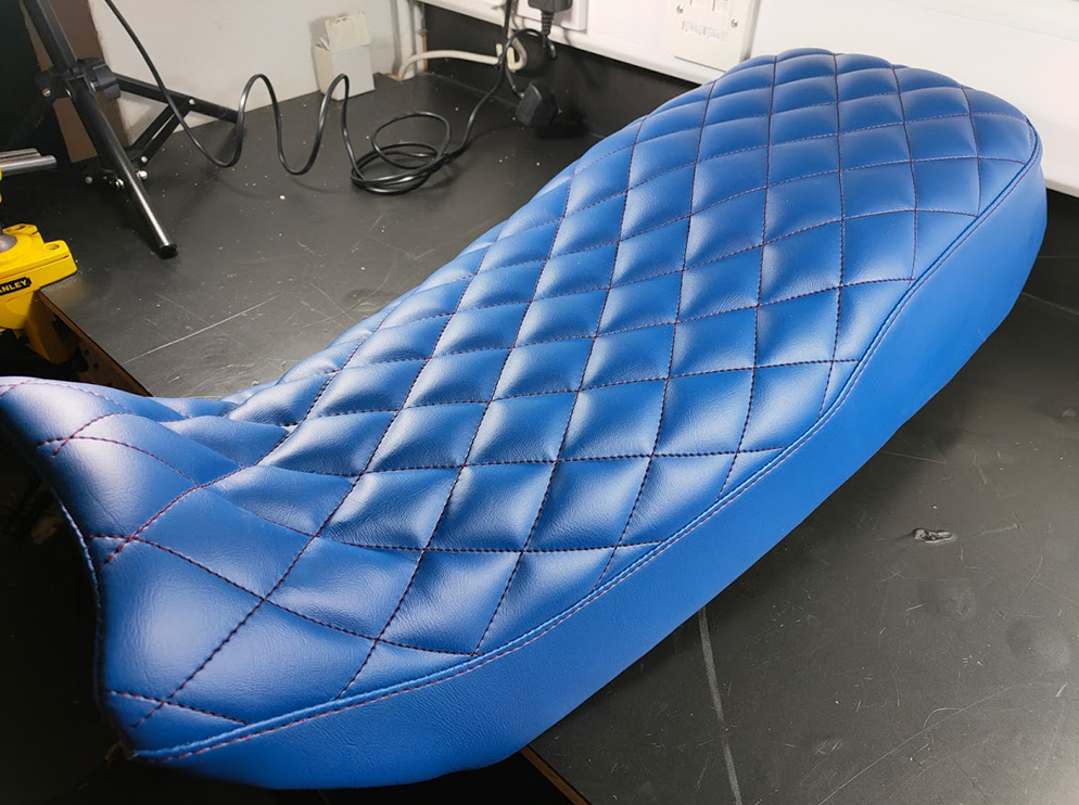 Blue scooped and quilted motorbike seat Boundary Car Care