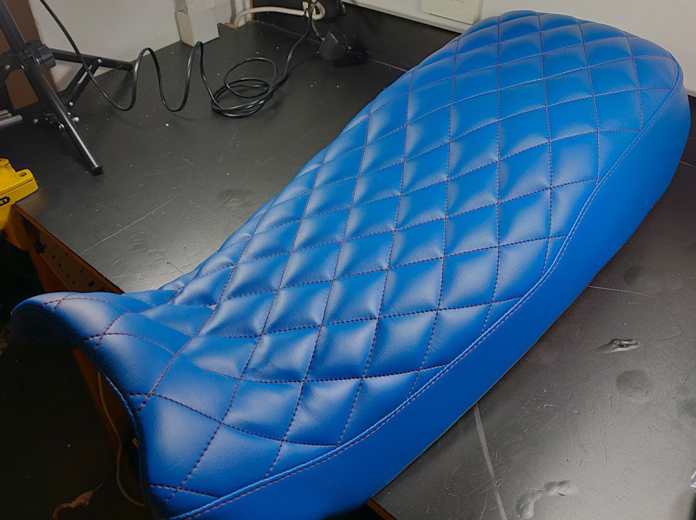 Blue scooped and quilted motorbike seat Boundary Car Care