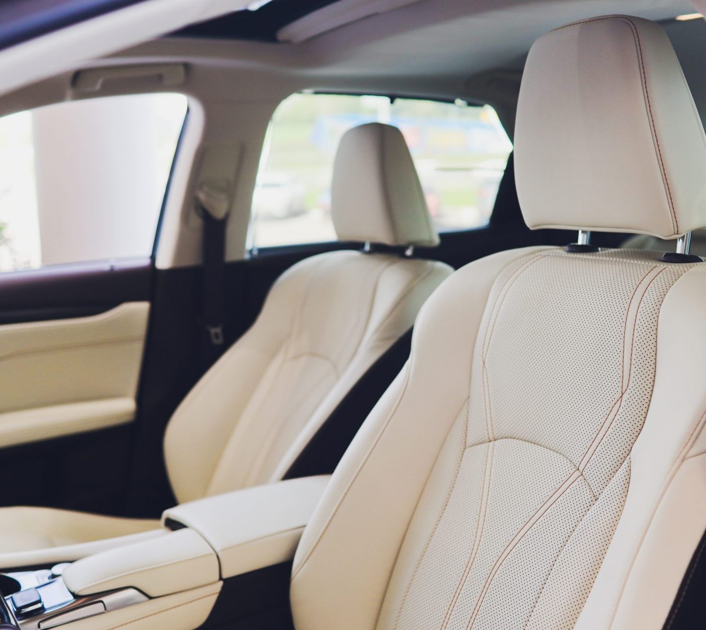 Interior of vehicle focussed on Leather seats with patterned centres Car leather seats