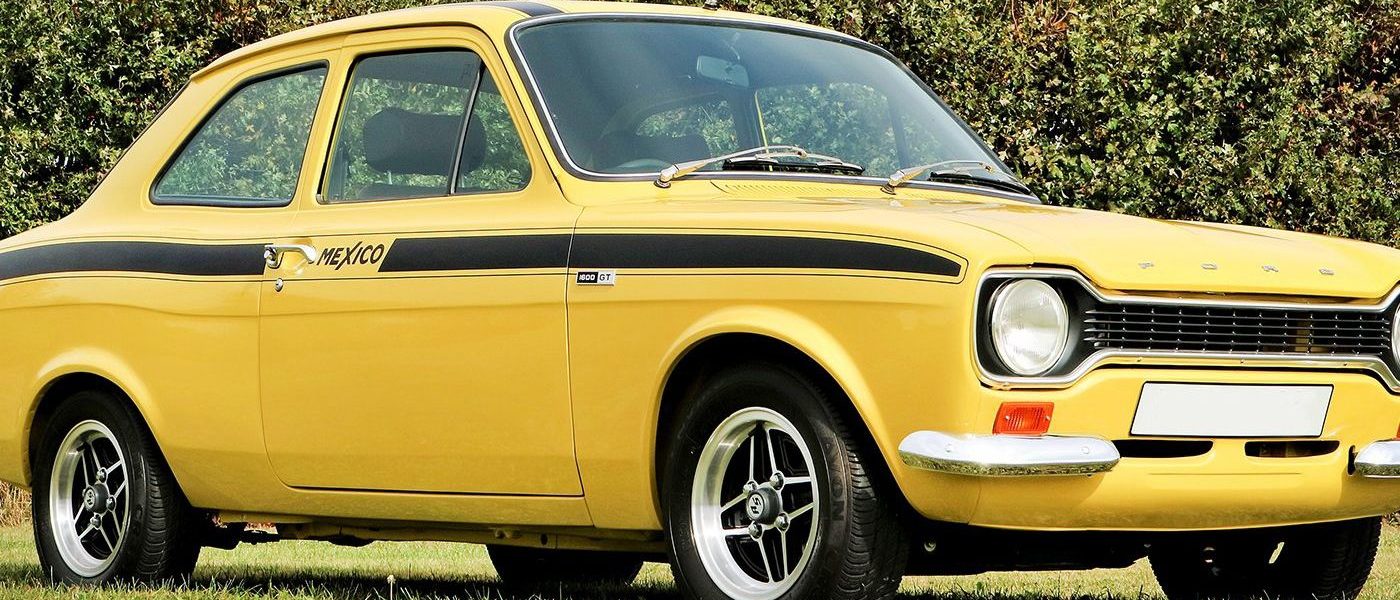 Yellow classic Ford Escort Mexico